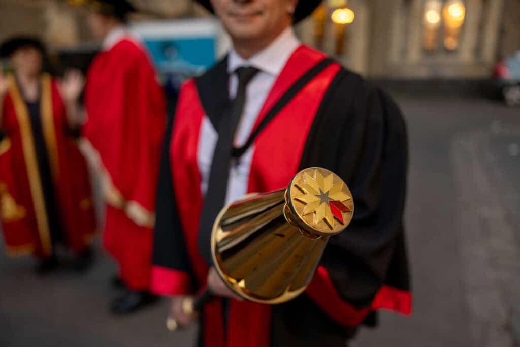 The mace is carried at a graduation ceremony.