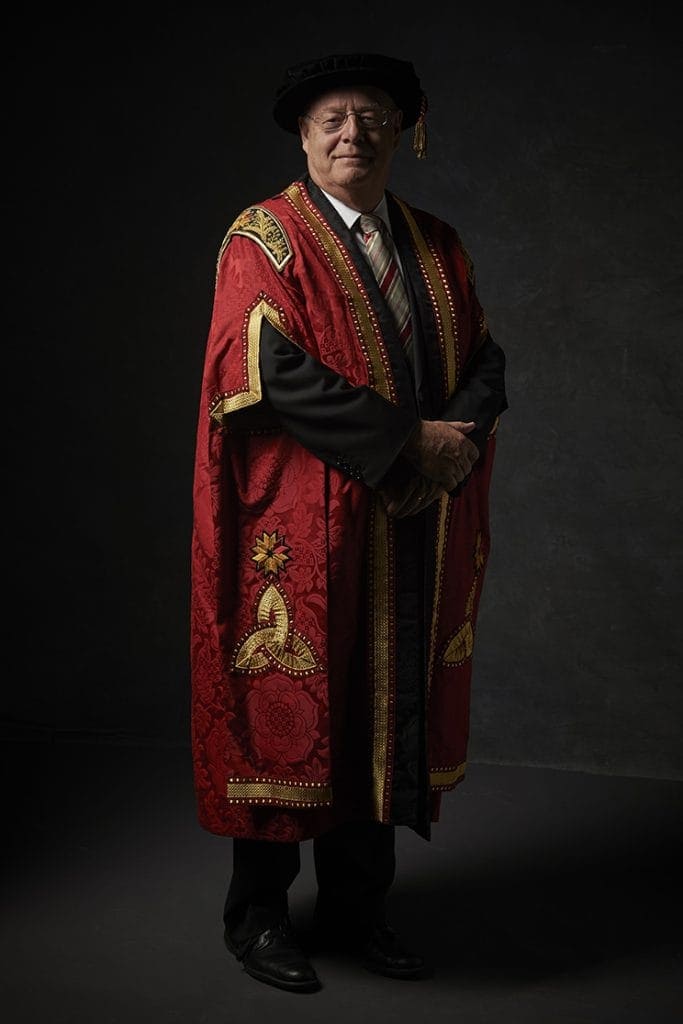Dr Graeme L. Blackman AO (first Chancellor of the University) wears the Chancellor’s robes