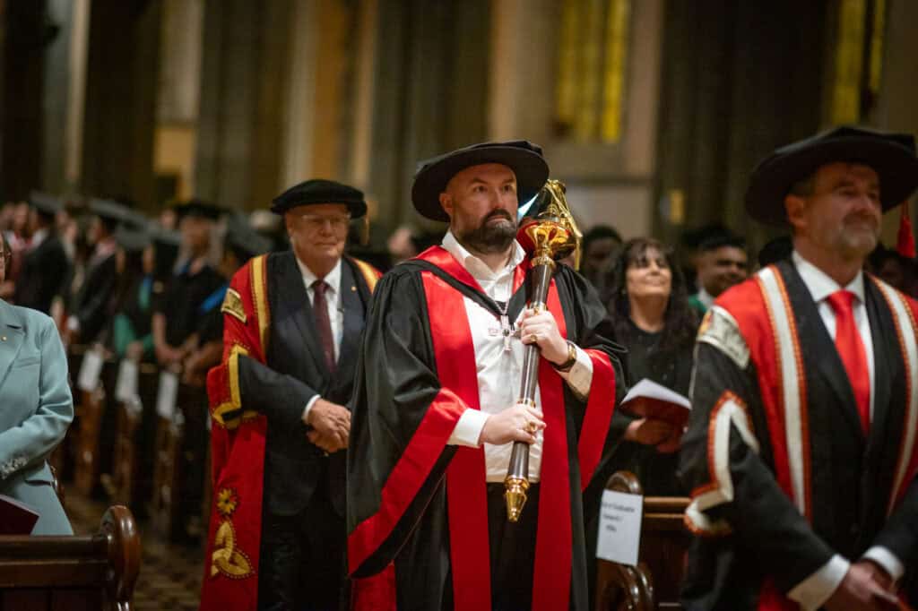 The mace was carried by doctoral graduate Andrew Mitchell at the 2025 Melbourne Graduation.
